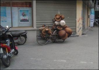 Bicycle in vietnam with hats on it