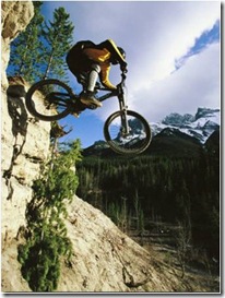 man jumping on his mountain bike