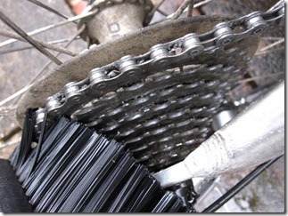 Clean the sprockets using a brush