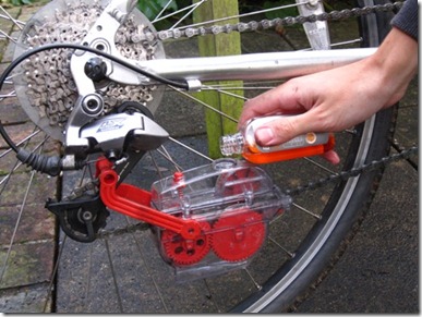 Pouring degreasing into the Bikehut chain cleaning kit