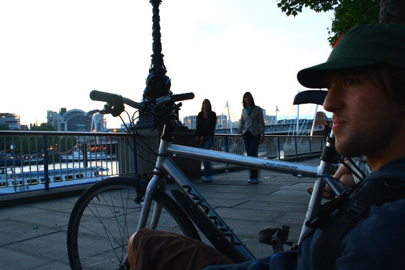 London Cyclist by the River