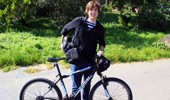 Me posing next to my rented blue Trek Mountain bike