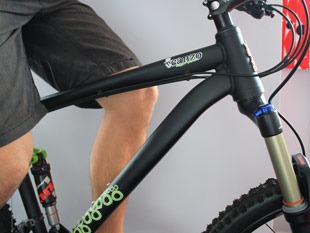 Sitting on the bike for step 4 of suspension fork sag maintenance