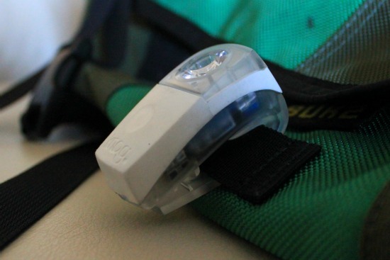 Knog Wearable Boomer in a close up shot attached to a messenger bag