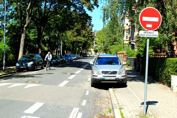 Another road where bicycles are permitted to travel in both directions and cars are not