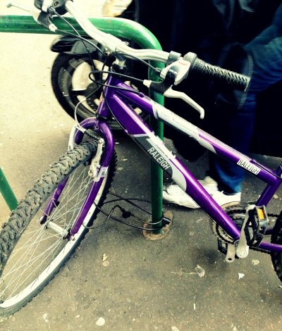 One bicycle lock around front wheel only