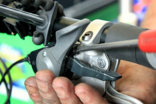 Remove the gear cable cover