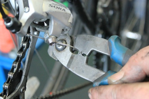 Fit metal ferrule to the end of gear cable