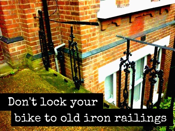 Picture showing iron railings that have been cut by thieves to remove a bike