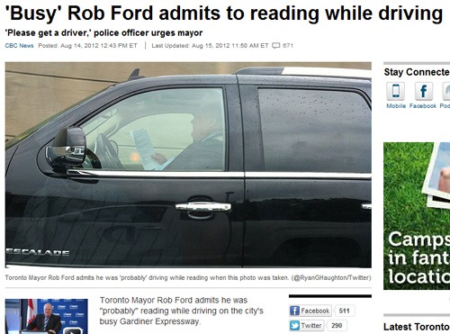 Mayor reading and driving Mayor reading and driving