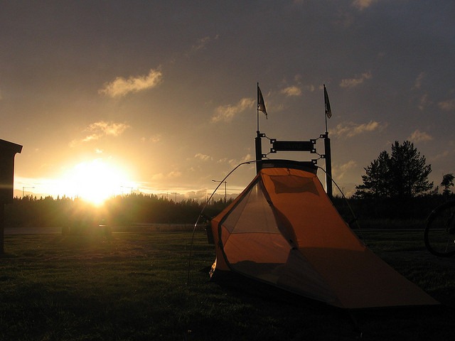Tent with the sun in the background