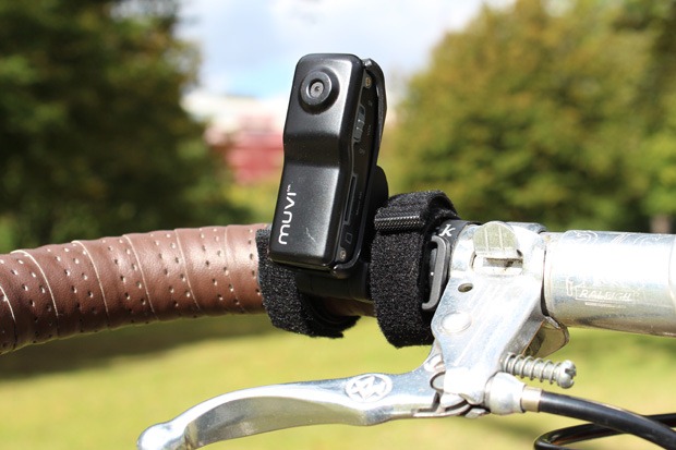 Veho helmet camera attached to bicycle handlebars Veho helmet camera attached to bicycle handlebars