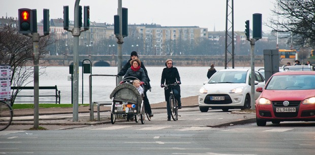 Copenhagen cyclists waiting at traffic light Copenhagen cyclists waiting at traffic light