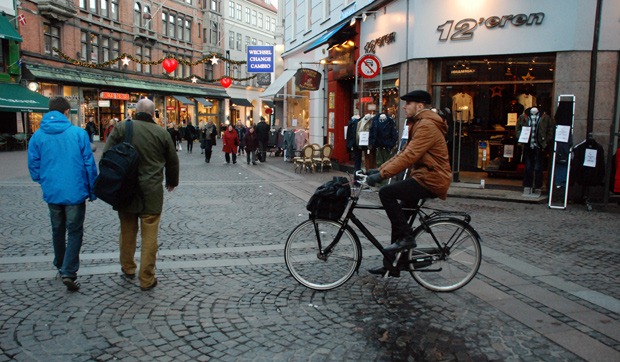 Cyclist on a collission route with pedestrians Cyclist on a collission route with pedestrians