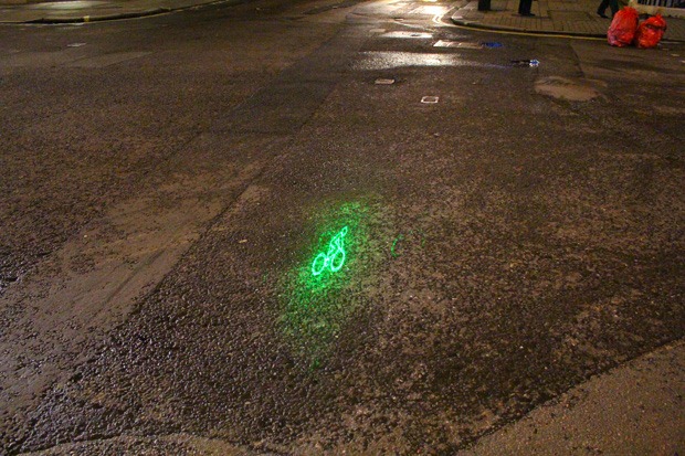 Blaze bike light symbol shining on the road