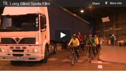 A screengrab from a TFL film about lorry blind spots showing cyclists next to a lorry