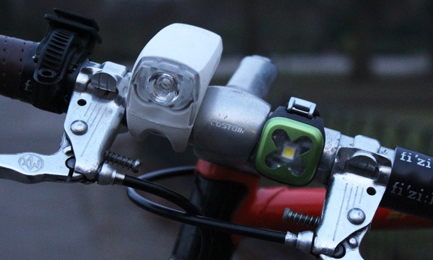 Knog blinder on the bicycle handlebars Knog blinder on the bicycle handlebars