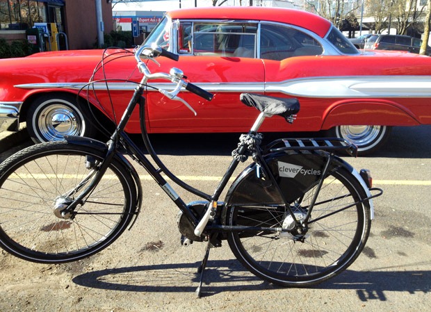 Bike next to car in Portland