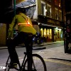 The Commuter X4 bike light fits with straps around your shoulders of back pack and provides a light that is visible from more angles